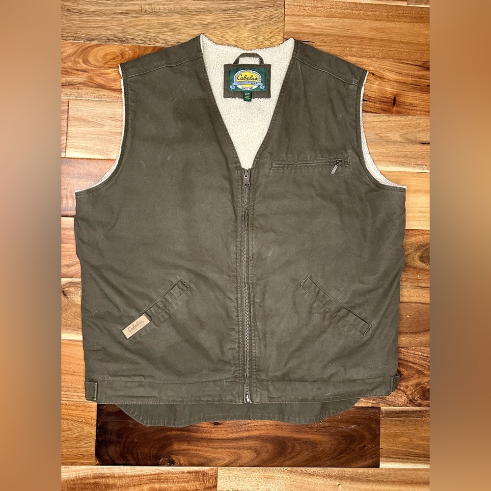 Cabela’s sherpa lined canvas work vest. XL.
